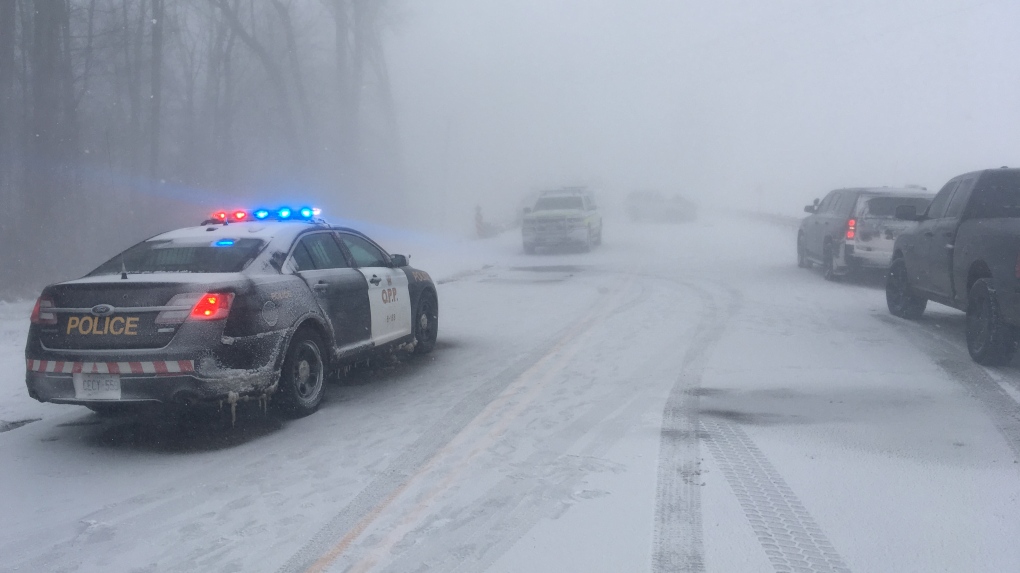 Police on scene of a snowy crash