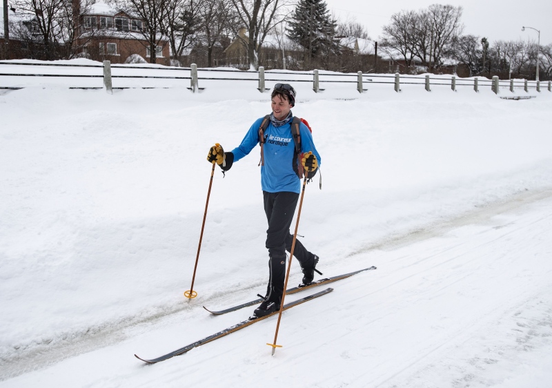 Lucas Badenduck cross country skis on the Rideau Canal Skateway as he heads to work downtown during a winter storm in Ottawa on Wednesday, Feb. 13, 2019. THE CANADIAN PRESS/Justin Tang