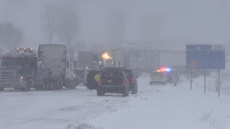 Emergency crews and tow operators work to clear the scene of a multi-vehicle crash on Highway 401 near Ingersoll, Ont. on Wednesday, Feb. 13, 2019. (Bryan Bicknell / CTV London)