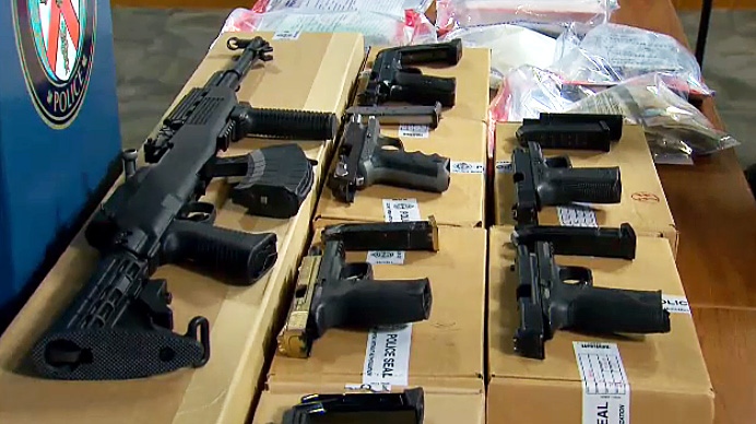 Toronto police display a number of firearms seized during a series of search warrants connected to "Project Moses" on Feb. 18, 2019. 