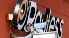 A crane operator installs a Payless Shoesource sign to the front of the store Thursday afternoon, Jan. 19, 2012, on Range Line Road in Joplin, Mo. Payless ShoeSource Canada Inc. says it will soon file for creditor protection in Canada and close all 2,500 of its North American stores this spring. THE CANADIAN PRESS/AP, The Joplin Globe, T. Rob Brown