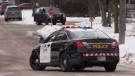 OPP 'contain' a home, shutting down Main Street in Listowel, Ont. on Friday, Feb. 22, 2019. (Scott Miller / CTV London)