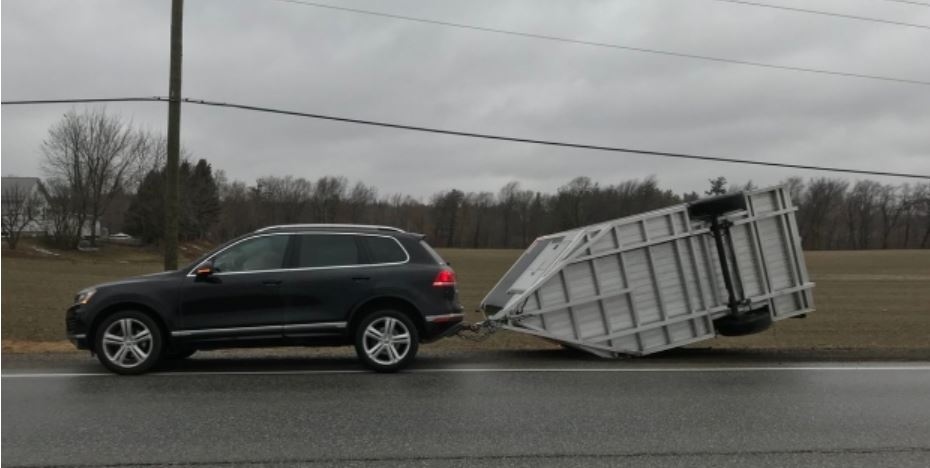 High winds blew a trailer over on Highway 3 