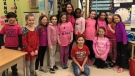 Students at Kensal Park Public School show off their 'pink' on Pink Shirt Day in London, Ont. on Wednesday, Feb. 27, 2019. (@KensalParkFI / Twitter)
