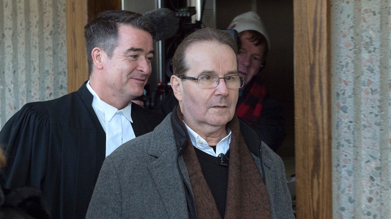 Glen Assoun, right, arrives at Nova Scotia Supreme Court with his lawyer Sean MacDonald in Halifax on Friday, March 1, 2019. (THE CANADIAN PRESS/Andrew Vaughan)