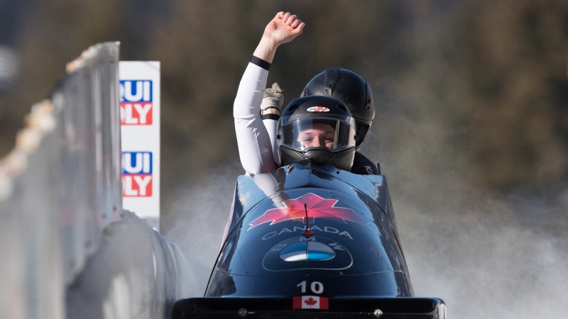 Canada's Christine de Bruin, front, of Stony Plain, Alta., and Kristen Bujnowski, of Moose Jaw, Sask., react after racing to a third-place finish during the women's bobsleigh event at the Bobsleigh World Championships in Whistler, B.C., on Sunday March 3, 2019. THE CANADIAN PRESS/Darryl Dyck