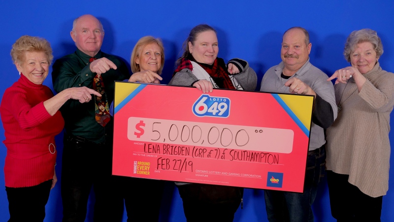 From left, Rose Shular, Robert Buckton, Janice Carey, Lena Brigden, Charles Schmalz and Marie Jones pick up their winnings in Toronto, Ont.