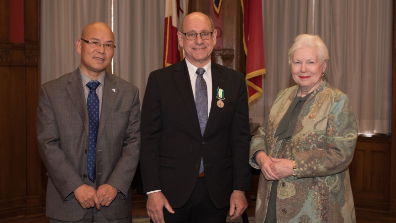 Tecumseh's Frank Perissinotti receiving the Ontario Medal for Good Citizenship from Elizabeth Dowdeswell, the Lieutenant Governor of Ontario. (Photo credit: Christina Gapic)