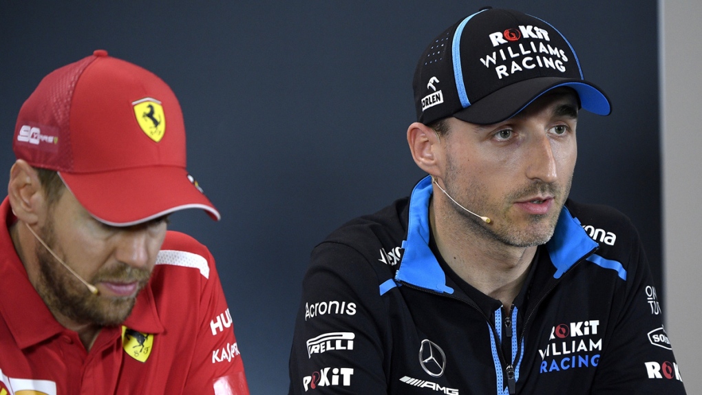 Williams driver Robert Kubica, right