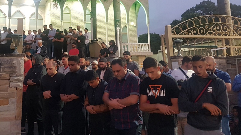 Worshippers pray for victims and families of the Christchurch shootings during an evening vigil at the Lakemba Mosque in Wakemba, New South Wales, on March 15, 2019. (Mark Goudkamp via AP)