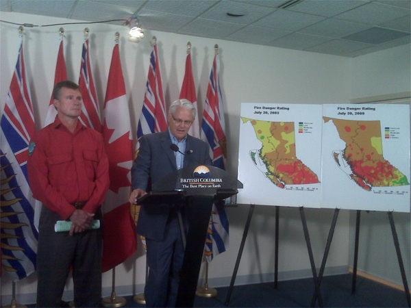 B.C. Premier Gordon Campbell speaks to reporters about the record fire danger in the province from his Vancouver cabinet office on July 31, 2009.