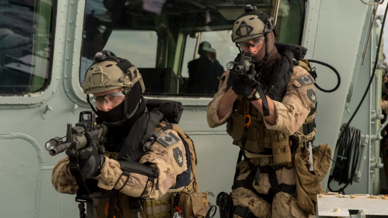 Naval Tactical Operations Group members conduct a boarding exercise on HMCS Charlottetown during Operation Reassurance in the Mediterranean Sea. (Royal Canadian Navy)