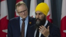 NDP MP Peter Julian looks on as leader Jagmeet Singh speaks during a news conference in Ottawa, Wednesday March 13, 2019. (THE CANADIAN PRESS/Adrian Wyld)