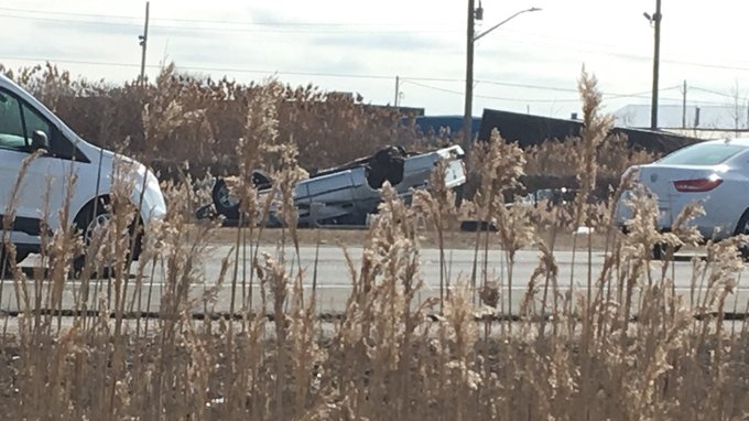 A truck flipped onto is roof on EC Row Expressway between Jefferson and Central Avenue in Windsor, Ont., Friday, March 29, 2019. (Ricardo Veneza / CTV Windsor). 