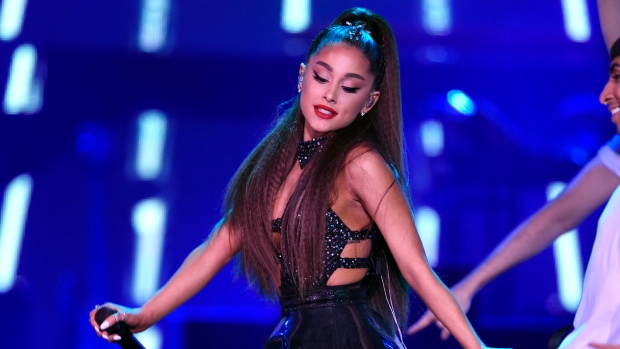 Ariana Grande says she's 'in so much pain' and has trouble breathing
