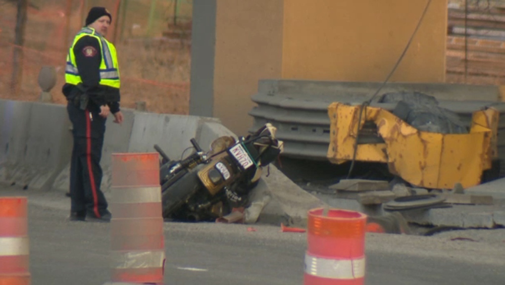 Motorcycle crashes into barrier - Crowchild Trail