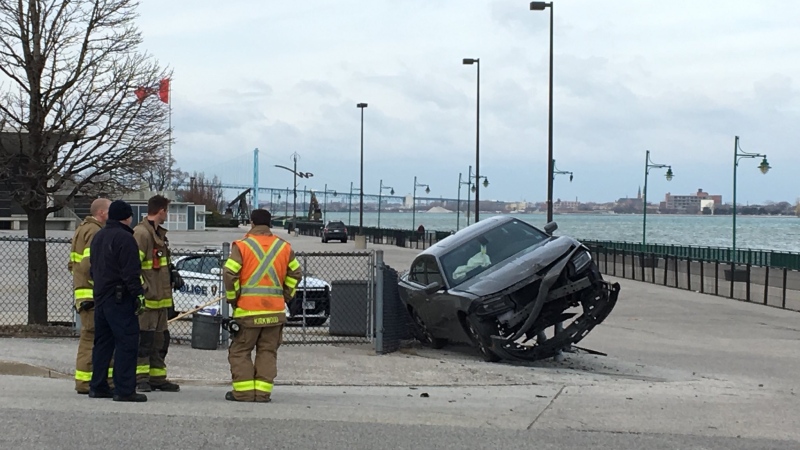 A single-vehicle crash at the foot of Glengarry Avenue at Riverside Drive involved a car stuck on a fence pole in Windsor, Ont., on Monday, April 8, 2019. (Ricardo Veneza / CTV Windsor)