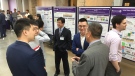 Researchers in Western University's Faculty of Engineering chat at announcement on solid state battery research in London, Ont. on Wednesday, April 10, 2019. (Bryan Bicknell / CTV London)