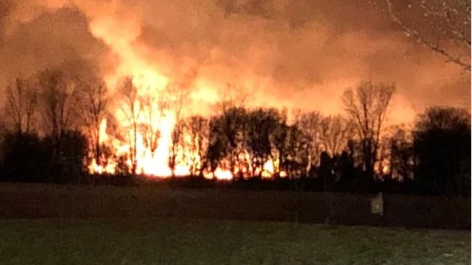 A fire seen on Fighting Island across from LaSalle on April 13, 2019 (Photo by AM800's Gord Bacon)