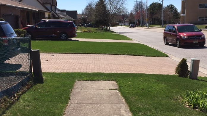 A sidewalk out front of Bellewood Public School, where a crosswalk is proposed at nearby Northway Ave. (Evan Johnson)