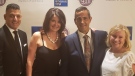 Al Quesnel accepts the Believe Windsor-Essex honour from Eddie Francis at the BEA19 awards and annouces a $1-million donation to the House of Sophrosyne in Windsor, Ont., on Wednesday, April 25, 2019. (CTV Windsor)