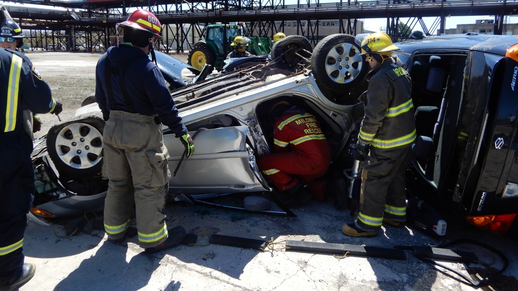 Firefighters participate in a extrication drill 