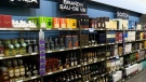 The Manitoba Liquor and Lotteries Corporation is being told to find opportunities for increased private-sector participation in liquor retail and distribution. (File image of bottles on display in a Liquor Mart.)
