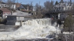 Dam in downtown Bracebridge, Ont. can't hold back the swollen waters of the Muskoka River on Sunday, April 28, 2019. THE CANADIAN PRESS/Fred Thornhill