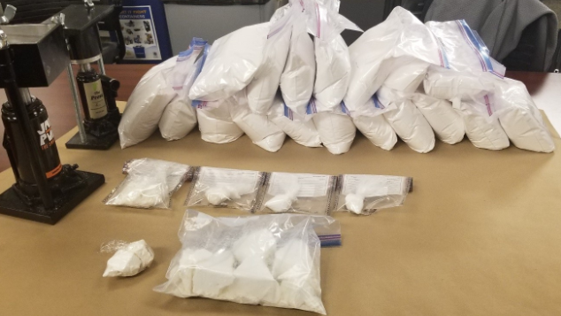Hydraulic presses and cocaine seized by police are seen in London, Ont. following raids on Thursday, May 2, 2019. (Source: London Police Service)