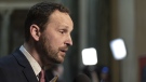 Opposition Leader Ryan Meili speaks to media during budget bay at the Legislative Building in Regina on Wednesday March 20, 2019. Saskatchewan's Opposition NDP leader is apologizing for the Sixties Scoop. THE CANADIAN PRESS/Michael Bell