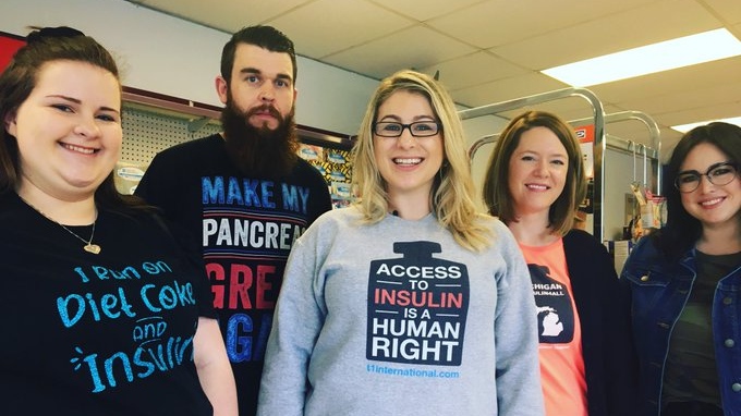 Jillian Rippolone (centre) and a group out of Michigan advocating for access to insulin visit Windsor's Yee Pharmacy to buy insulin in Canada at a tenth the cost of product in the U.S. on May 9, 2019. (Ricardo Veneza/CTV Windsor)