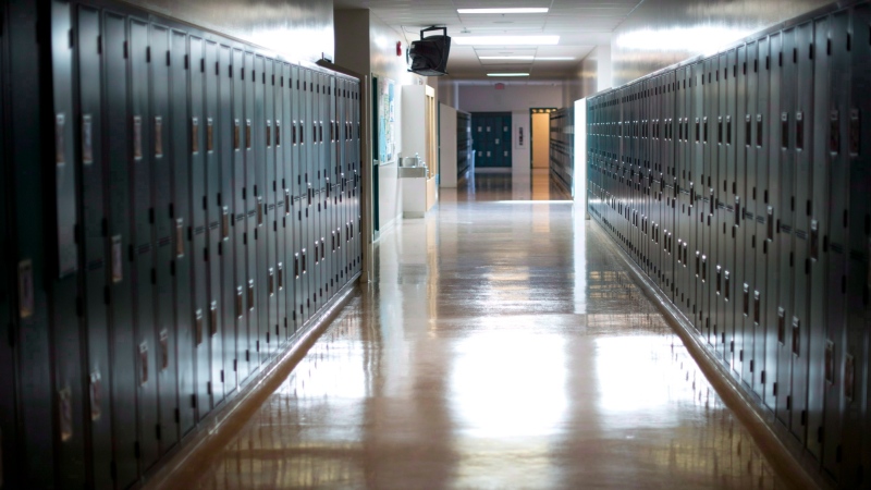 A empty hallway is seen at McGee Secondary school in Vancouver, on Sept. 5, 2014.  (THE CANADIAN PRESS/Jonathan Hayward)