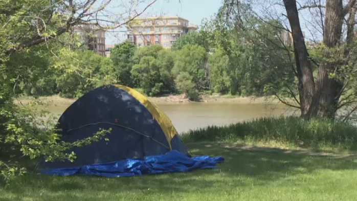 CTV file image of a camp set up on a river bank. 