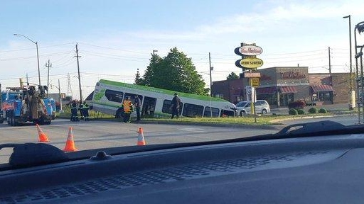 A tow truck pulls a Transit Windsor bus out of the ditch on Central Avenue in Windsor, Ont., on Tuesday, May 21, 2019. (Courtesy Ryan Orton)