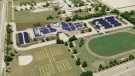 An artist's rendition shows what John Paul II Catholic Secondary School in London, Ont. will look like after a new clean energy system is installed.
