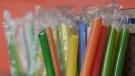 FILE - July 17, 2018 file photo of wrapped plastic straws (AP Photo/Jeff Chiu, File)