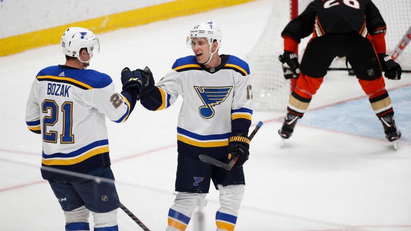 St. Louis Blues' Tyler Bozak, left, celebrates his goal with Jaden Schwartz during the third period of the team's NHL hockey game against the Anaheim Ducks on Wednesday, Jan. 23, 2019, in Anaheim, Calif. The Blues won 5-1. (AP Photo/Jae C. Hong)