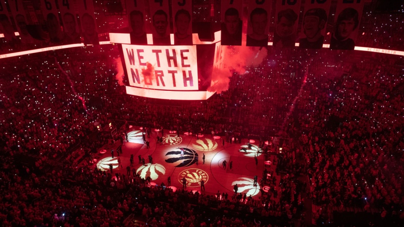 The light show begins on the court before first half NBA Eastern Conference finals action between the Toronto Raptors and the Milwaukee Bucks, in Toronto on Saturday, May 25, 2019. THE CANADIAN PRESS/Chris Young