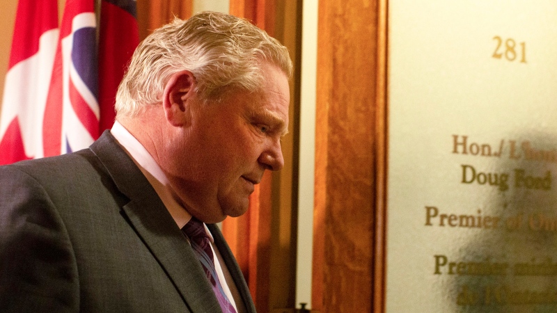 Ontario Premier Doug Ford returns to his office in the Queen's Park Legislature in Toronto on Monday, May 27, 2019. THE CANADIAN PRESS/Chris Young