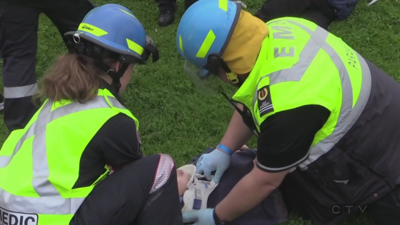 Emergency responders work at the scene of a mock disaster at Fanshawe College in London, Ont. on Wednesday, May 29, 2019. (Gerry Dewan / CTV London)