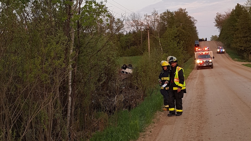 Emergency responders work at the scene of a crash involving a Hummer and a motorcycle near Markdale, Ont. on Wednesday, May 29, 2019. (Source: West Grey Police Service)
