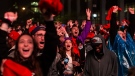 Toronto Raptors fans react as they watch Game 3 of the NBA Final between Toronto Raptors and Golden State Warriors in "Jurassic Park'' fanzone outside of Scotiabank Arena in Toronto on Wednesday June 5, 2019. THE CANADIAN PRESS/Chris Young