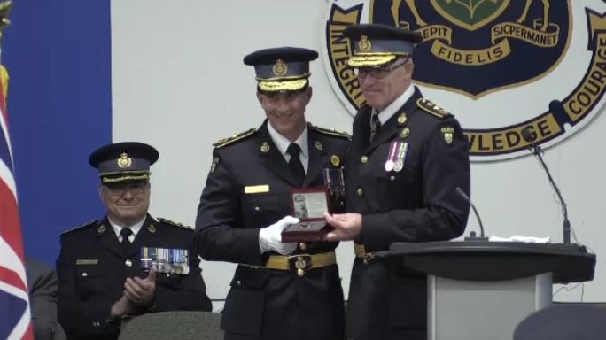 OPP Commissioner Thomas Carrique, centre, is seen at the Change of Command ceremony in Aylmer, Ont. on Thursday, June 6, 2019. (Jim Knight / CTV London)