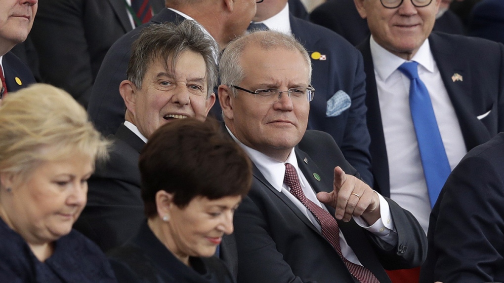 Australian Prime Minister Scott Morrison gestures