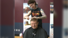 Local barber, Matthew O’Donoghue gives Stefan Horbay a fresh haircut at the Fresh Start Recovery Centre (Mark Villani/CTV Calgary) 