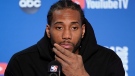 Toronto Raptors forward Kawhi Leonard speaks at a news conference after Game 4 of basketball's NBA Finals against the Golden State Warriors in Oakland, Calif., Friday, June 7, 2019. (AP Photo/Tony Avelar)