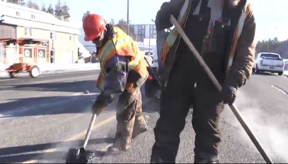 City of Greater Sudbury workers repair potholes