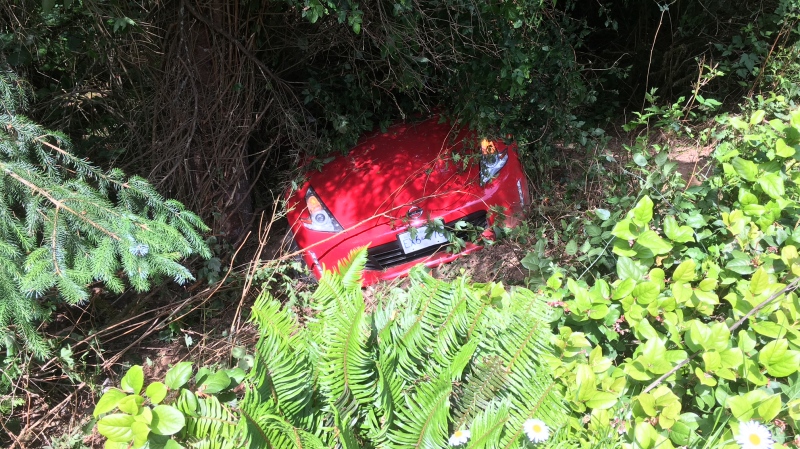 A woman plunged down an embankment on Gillespie Road in Sooke and had to be taken to hospital. June 13, 2019. (CTV Vancouver Island)