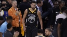 Golden State Warriors guard Klay Thompson (11) walks back onto the court to shoot free throws after being injured in Game 6 of the NBA Finals, on June 13, 2019. (Tony Avelar / AP)
