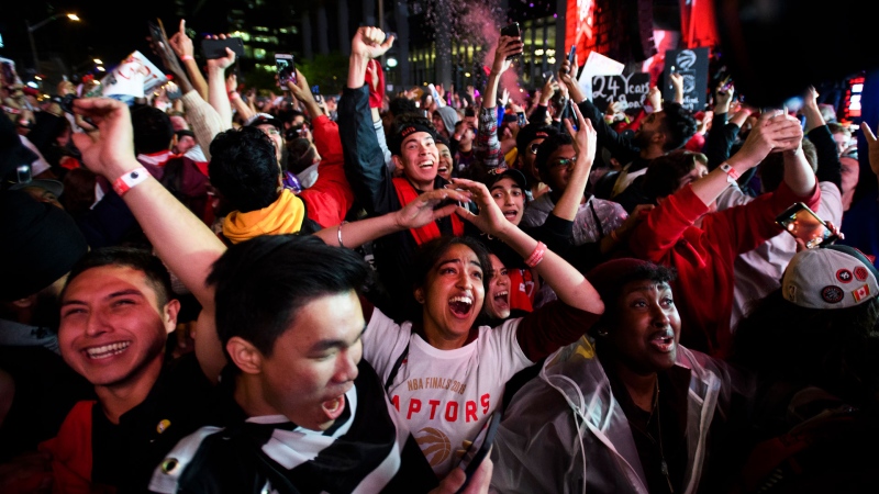 Fan reacts in Jurassic Park as the Toronto Raptors defeat the Golden State Warriors during Game 6 NBA Finals to win the NBA Championship, in Toronto on Thursday, June 13, 2019. THE CANADIAN PRESS/Nathan Denette